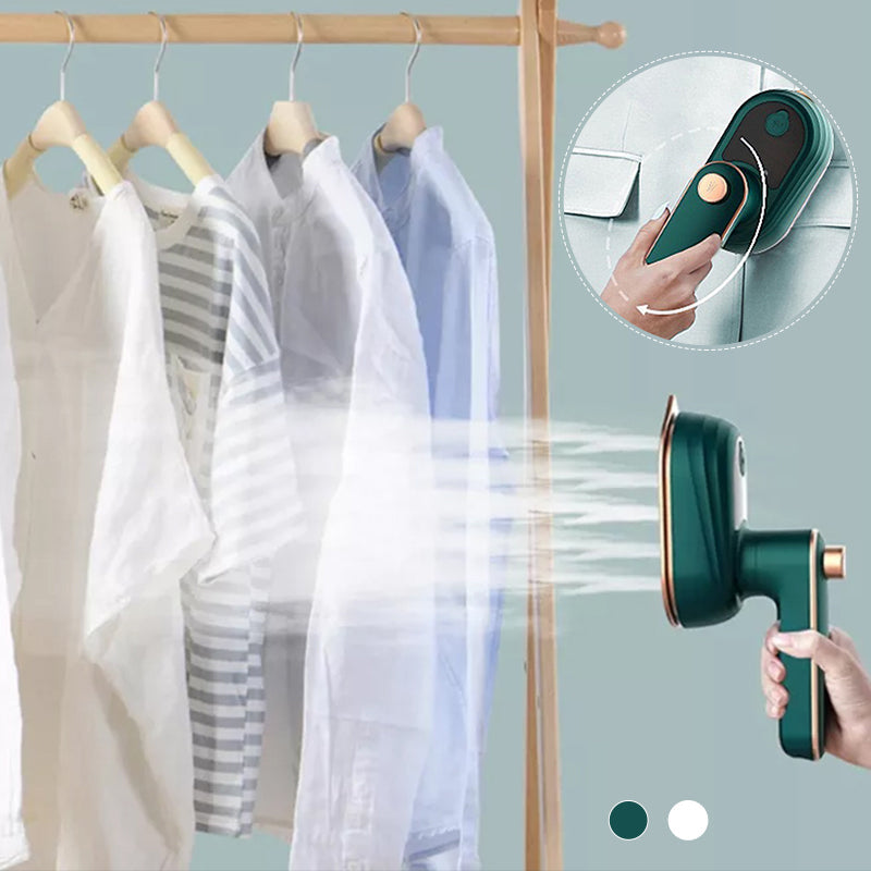 Portable green steam iron steaming hanging white shirts on a rack
