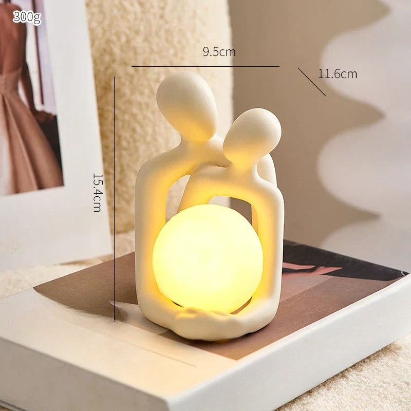 Side view of ceramic couple sculpture mood light with dimensional height measurements