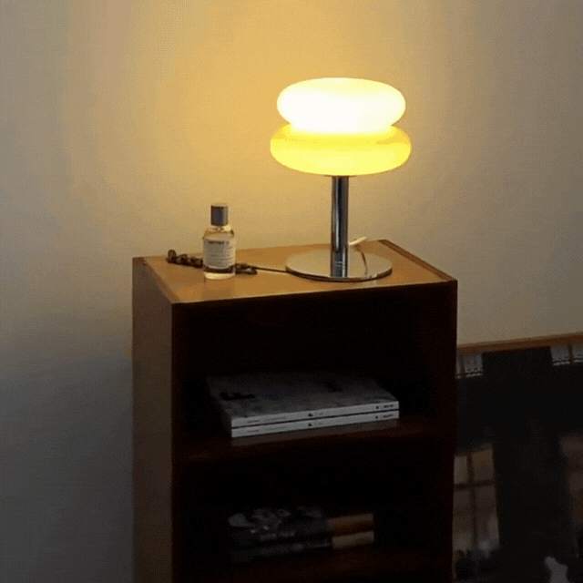 Minimalist home decor glass lamp providing warm ambient room illumination