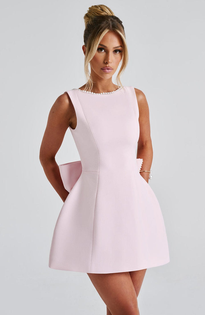 Women's pearl trim a-line mini dress front view, chic cocktail party attire