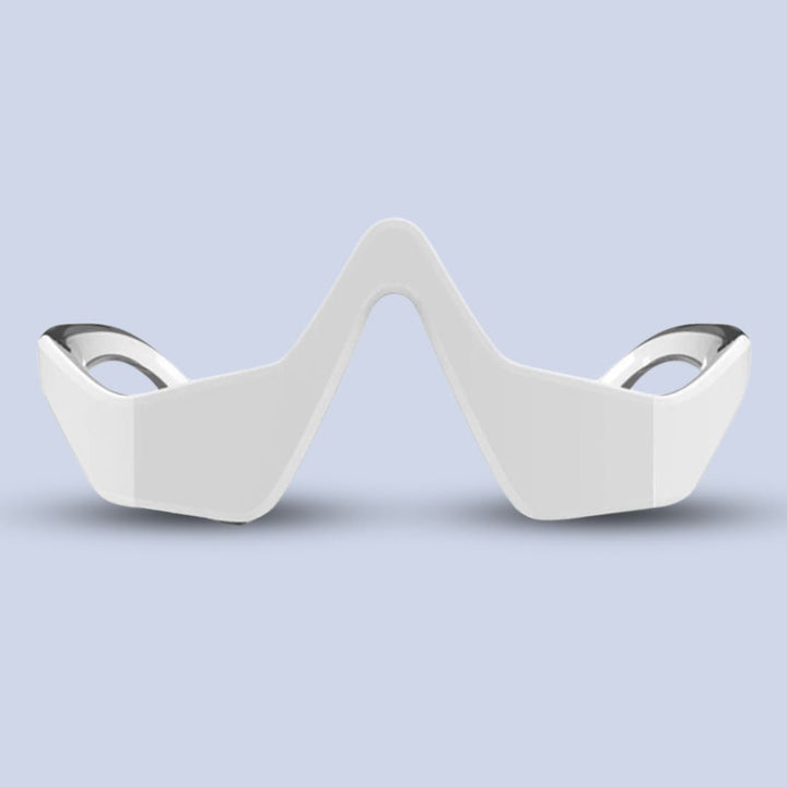 Front view of the sleek white electronic under-eye massager