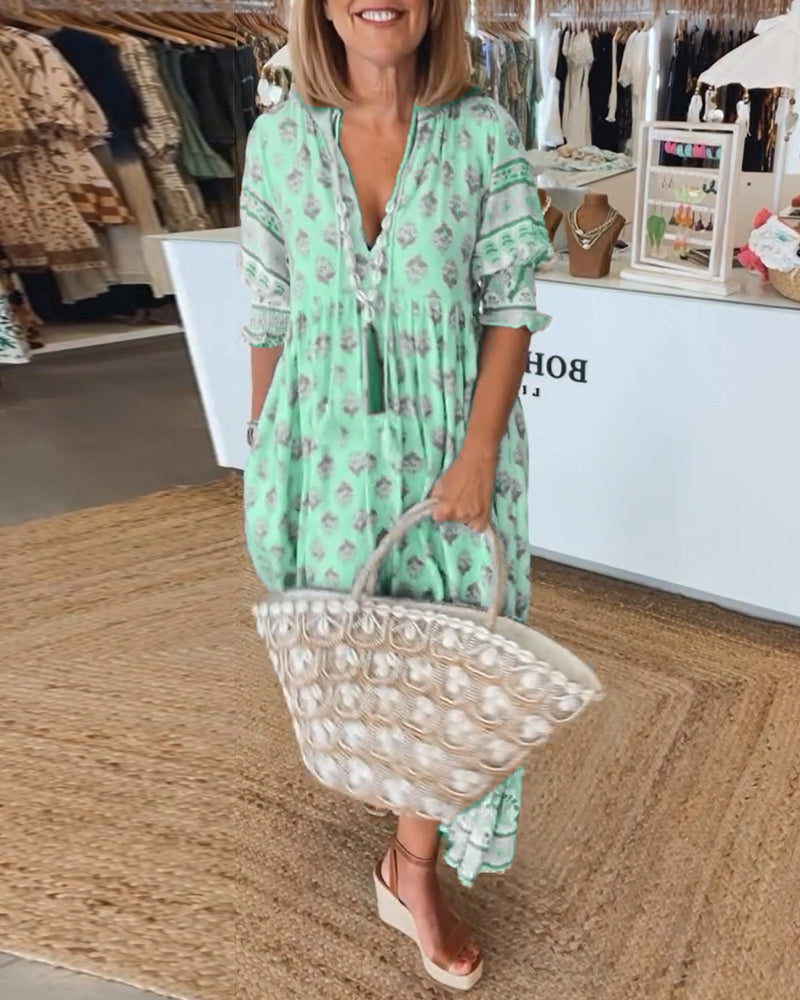 Side view of the women's half-sleeve printed casual summer dress