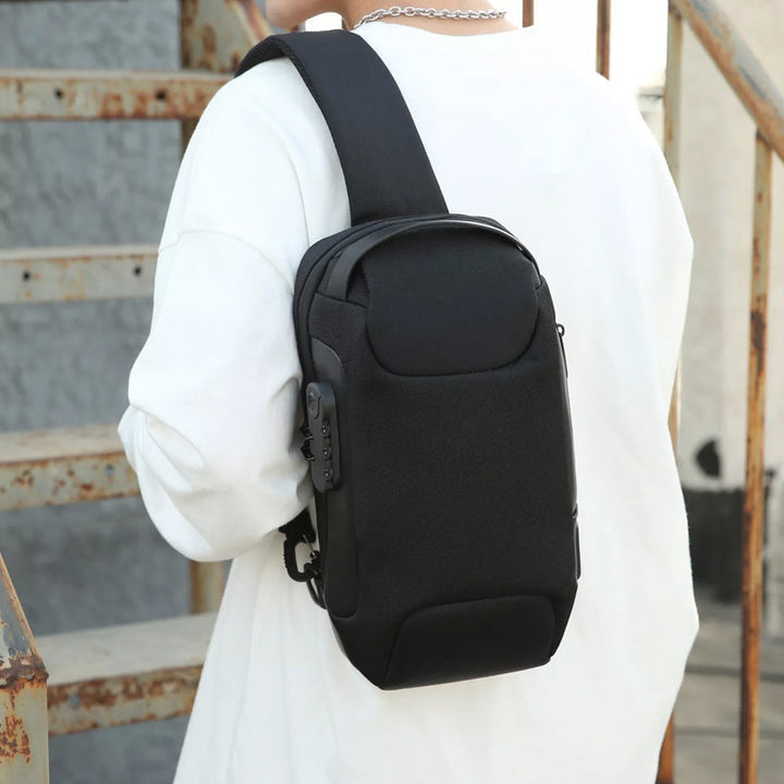 Close-up view of black anti-theft crossbody bag worn on back