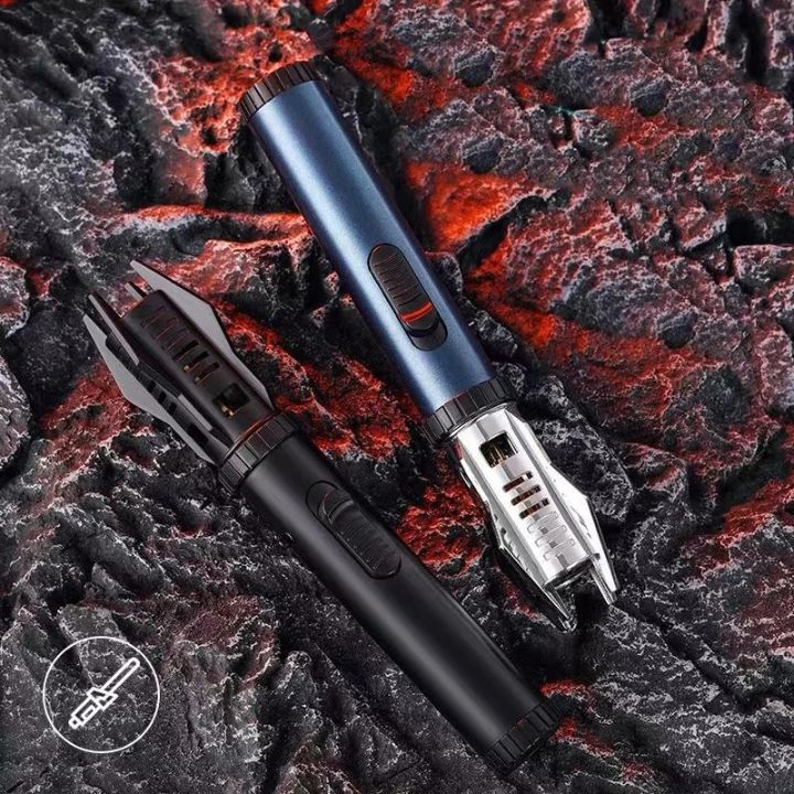 Black and blue windproof torch lighters displayed on rocky surface