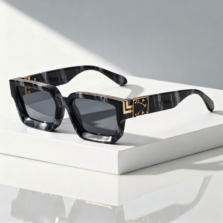 Marble pattern square sunglasses with gold accents against a neutral background