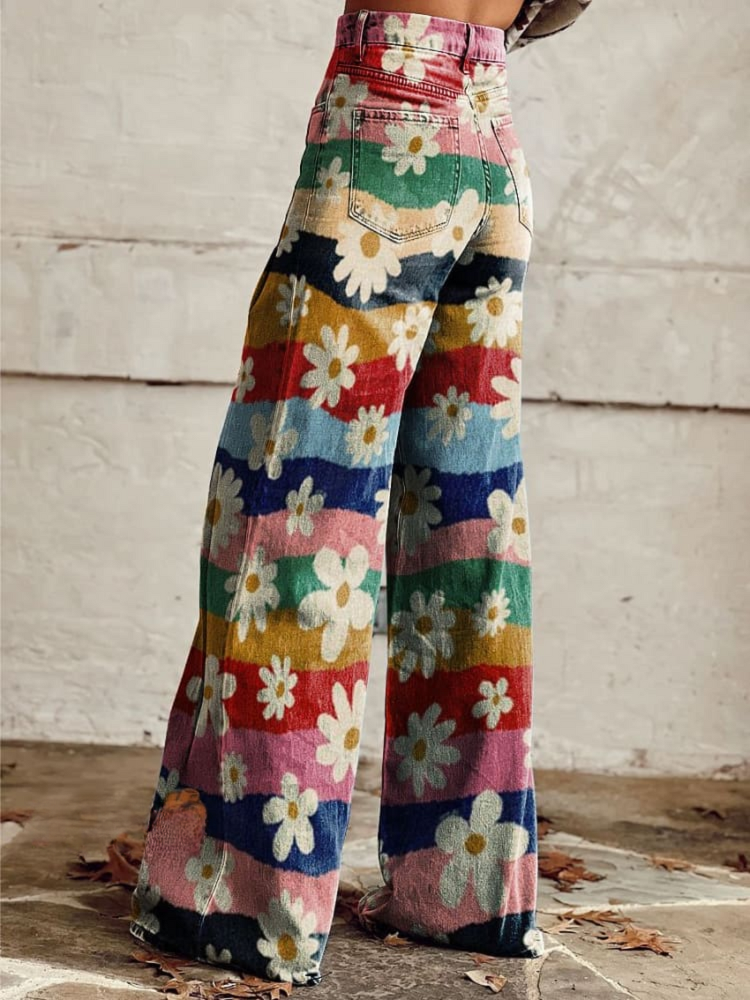 Back view of women's retro flared high-waisted floral trousers