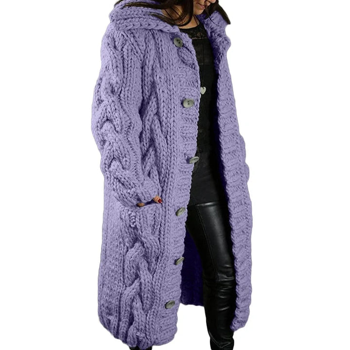 Woman wearing a purple chunky knit cardigan with relaxed fit