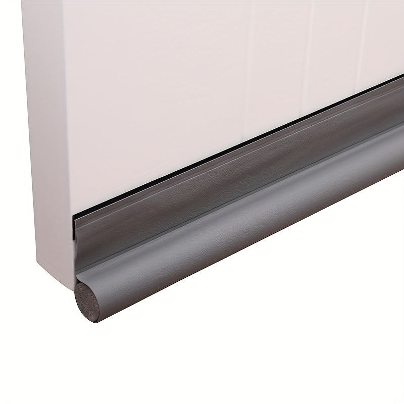 Grey door draught excluder attached to a white interior door