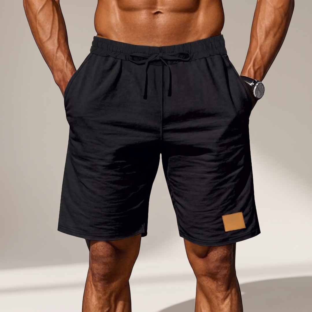 Side profile of mens summer wear shorts showing relaxed fit and pocket detail
