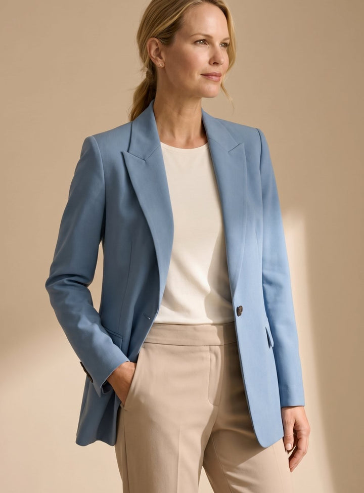 Full length view of the chic office wear two piece trouser suit