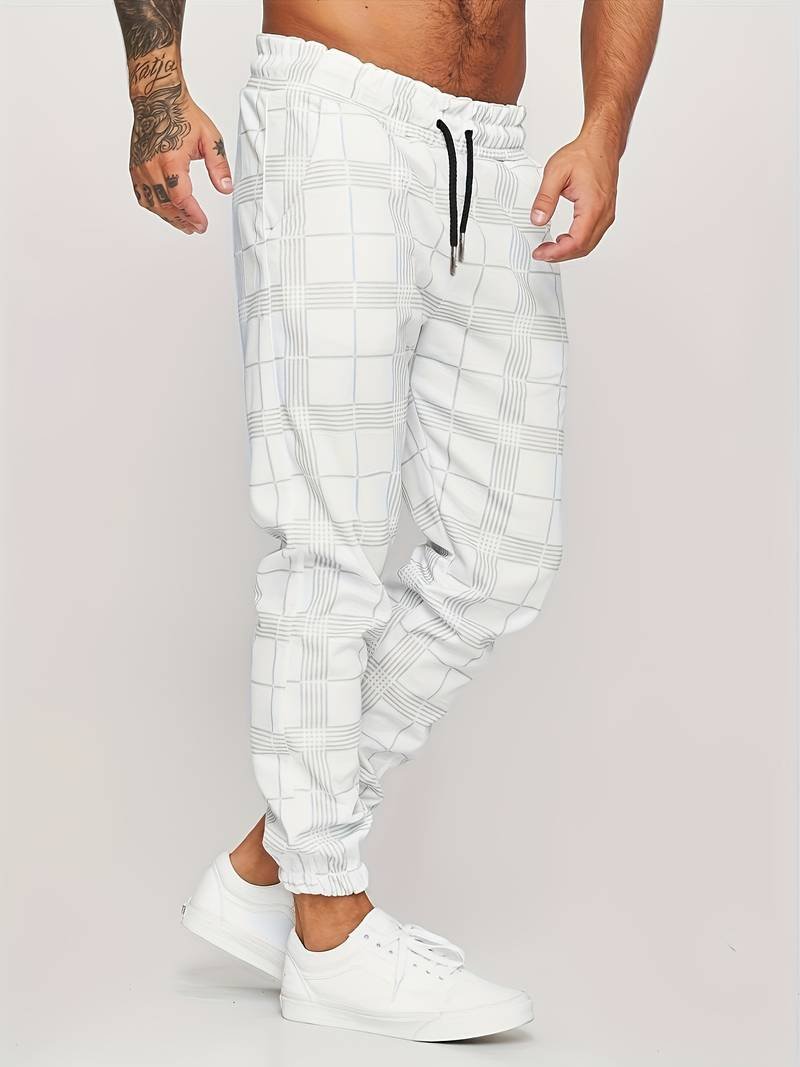 Man wearing white modern checked jogger pants with black drawstring