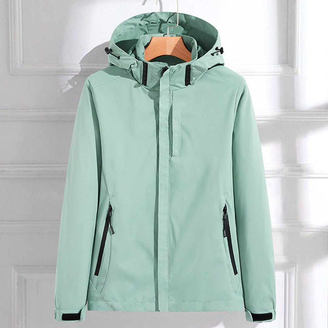 Mint green waterproof adjustable hooded rain jacket hanging