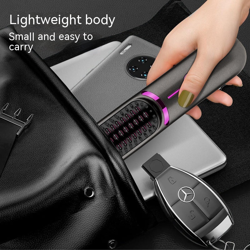 Rechargeable hair straightening brush displaying LED temperature settings