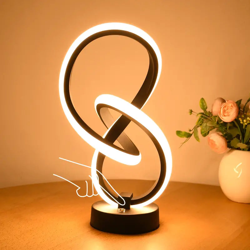 Adjustable LED mood lamp glowing brightly on a wooden table