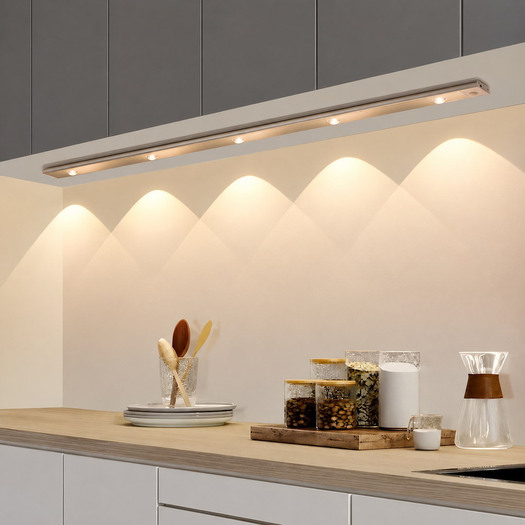LED cabinet light mounted under kitchen cupboards illuminating countertop