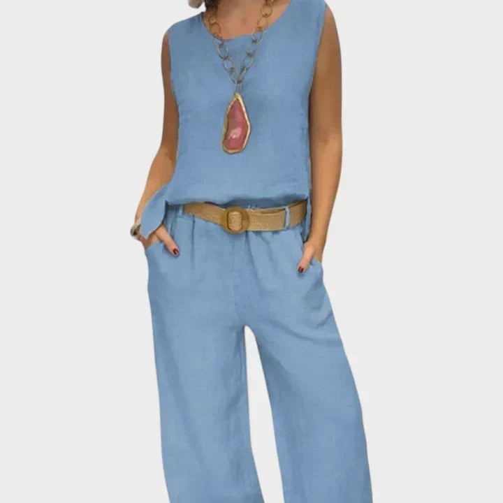 Woman wearing light blue bohemian sleeveless top and cropped pants set