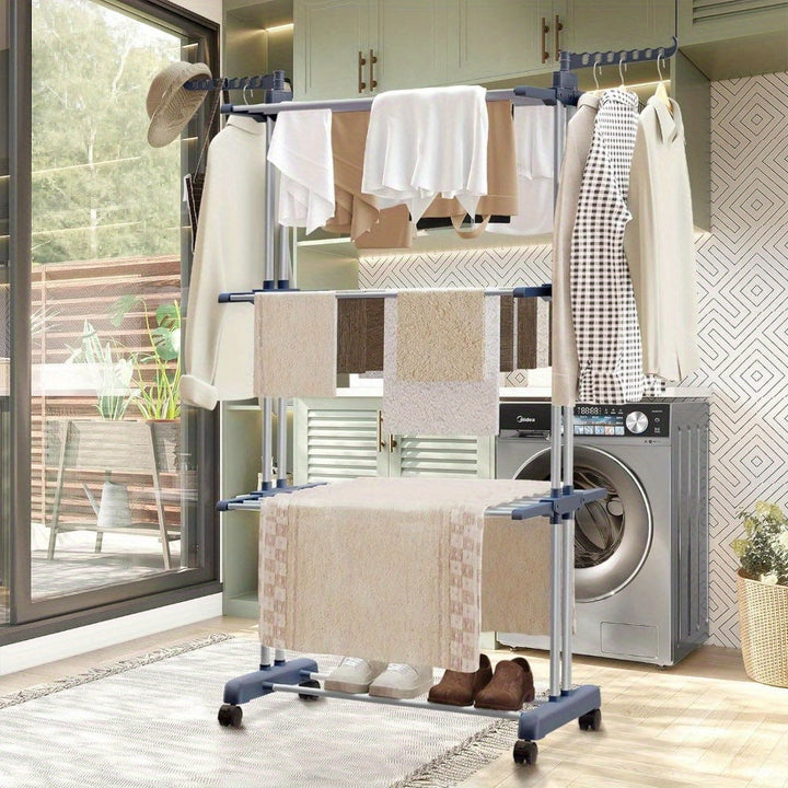 Vertical clothes airer set up in a modern kitchen near a washing machine