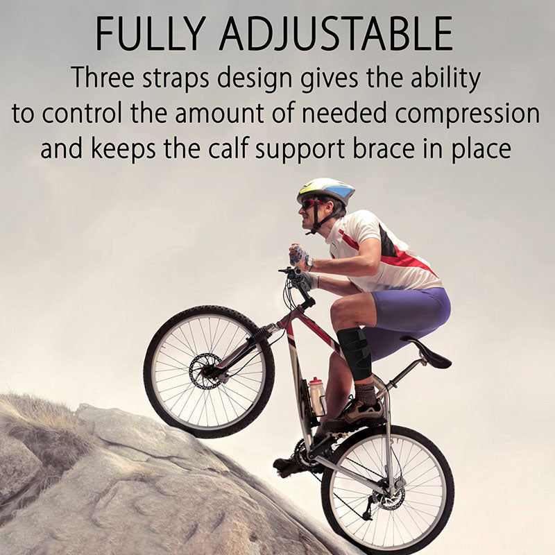 Cyclist wearing calf support brace while riding outdoors