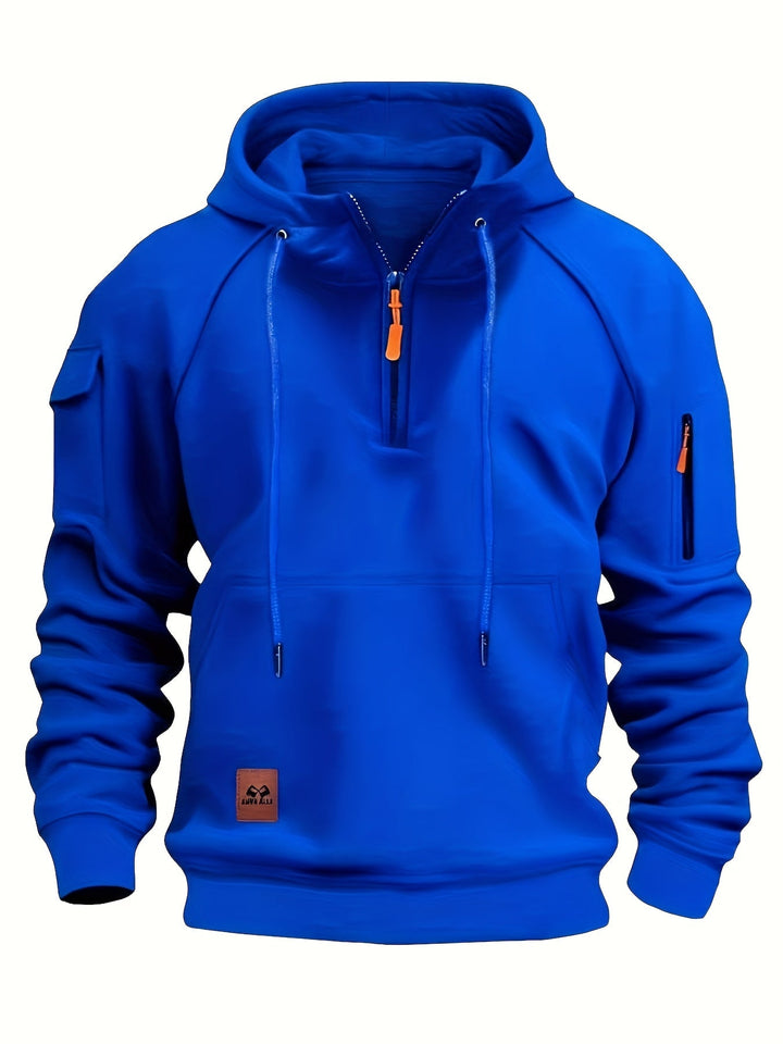 Close-up of ribbed cuffs on long sleeve men's rugged quarter-zip hoodie.