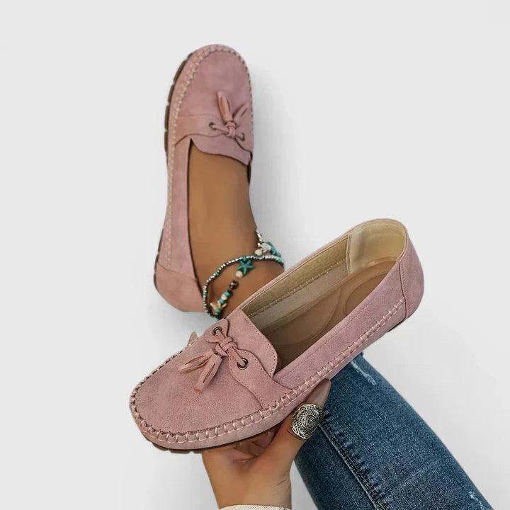 Pink women's slip-on loafers viewed from above