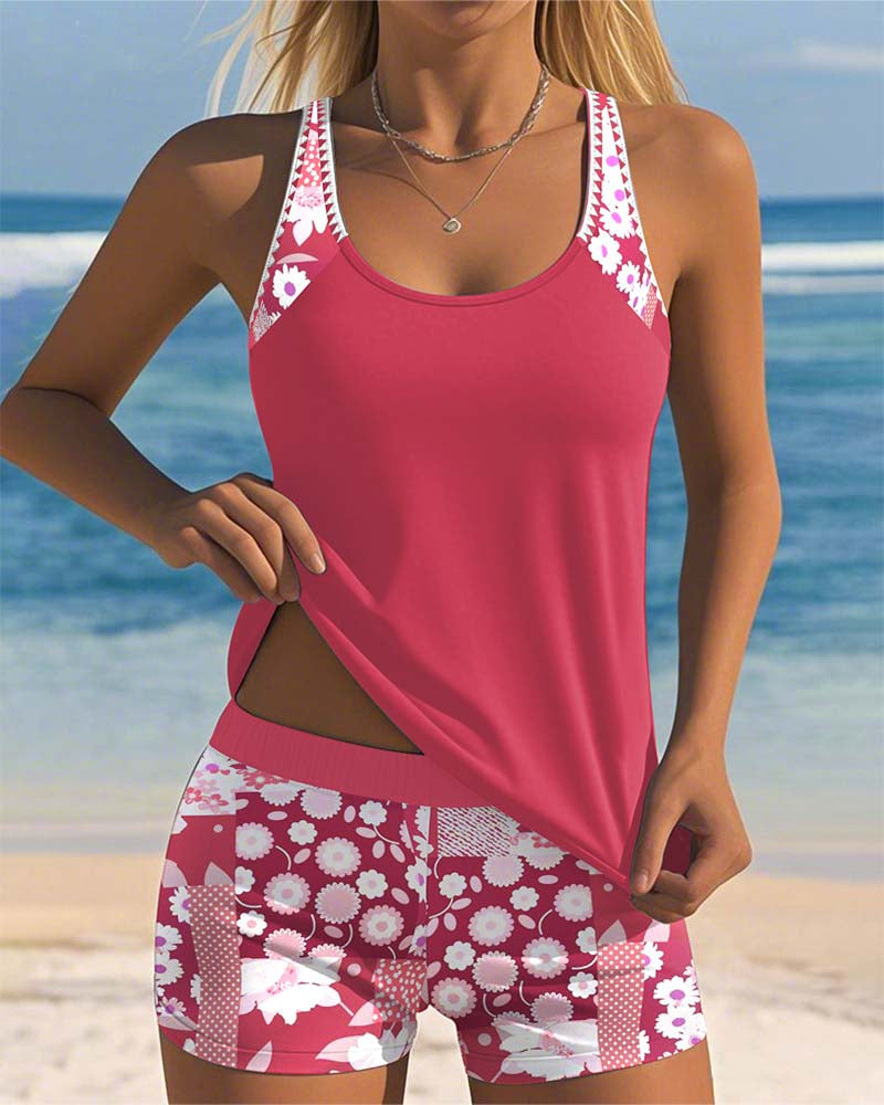 Woman wearing pink floral tankini swim set at the beach
