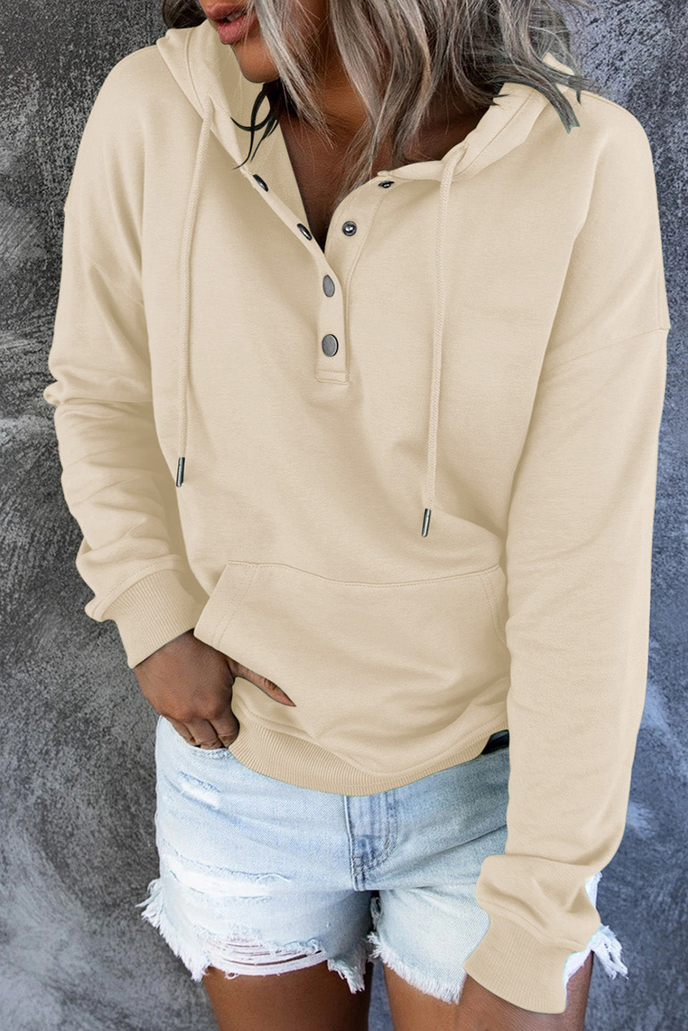 Assorted women's cozy hooded sweaters in three colors