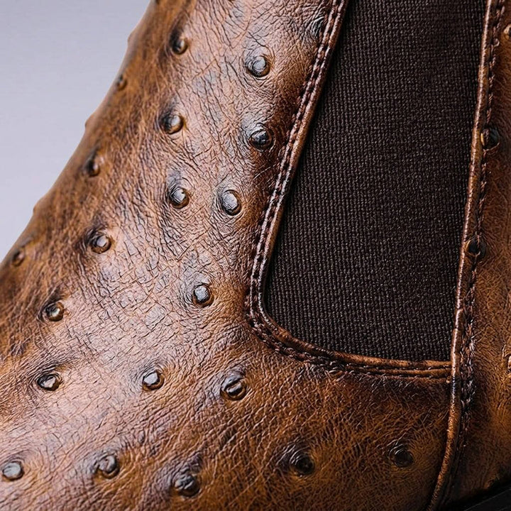 Back view of stylish leather ankle boots for men with pull loop