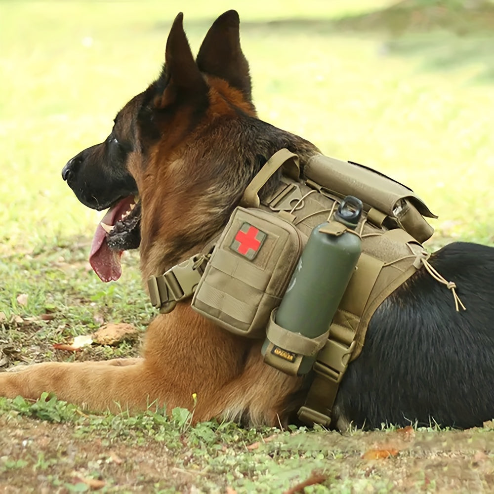German Shepherd resting outdoors wearing a khaki tactical dog harness with attached pouches and water bottle