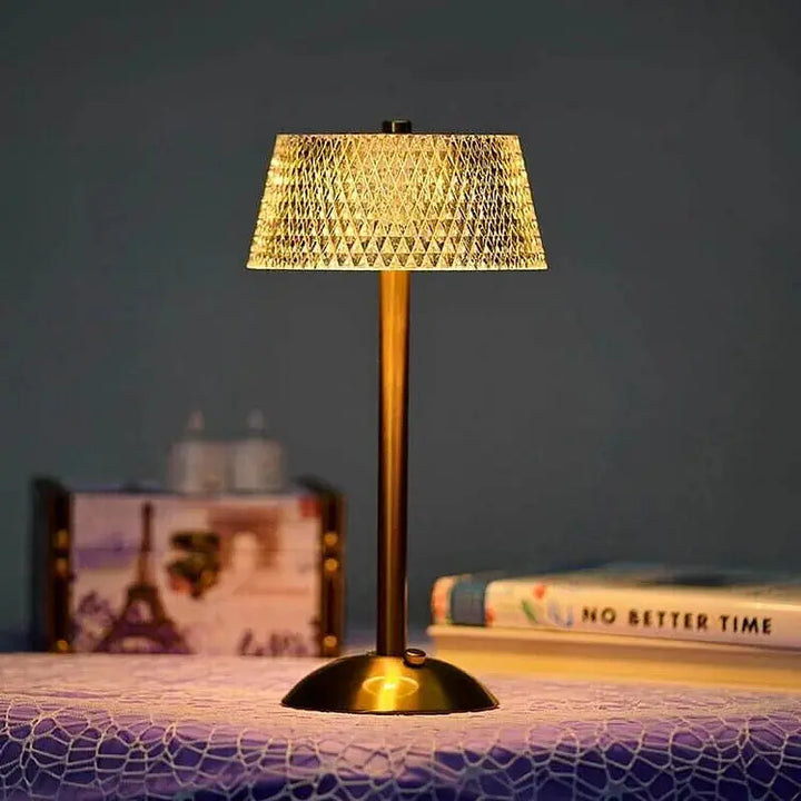 Modern wireless table lamp casting ambient light on a nightstand