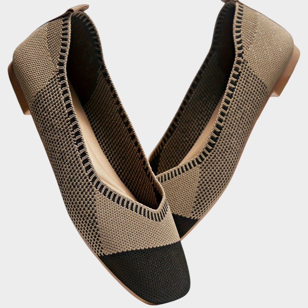 Side angle view of women's breathable woven ballet flats showing sole profile