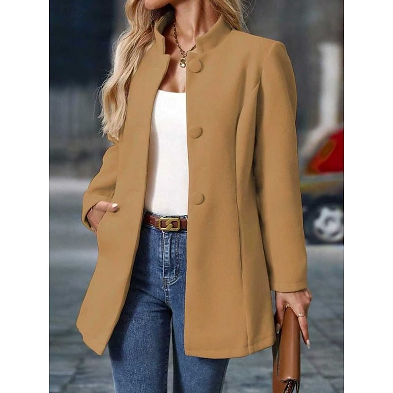 Full-length view of model wearing the elegant women's trench coat apparel