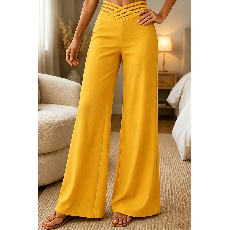 Close-up fabric and stitching detail of women's elegant wide-leg trousers