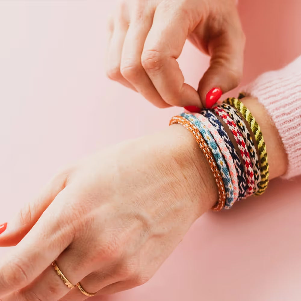 Handmade friendship bracelet created using the kumihimo craft kit