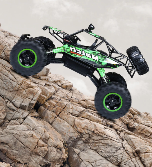 Green BeastRider RC monster truck climbing steep rocky terrain