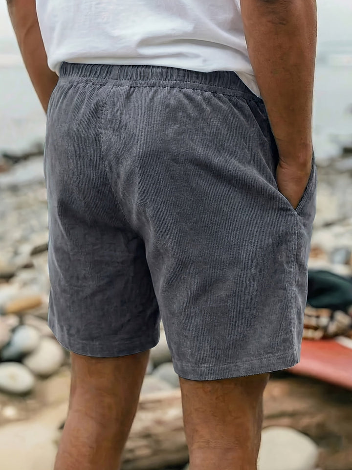Close up view of elastic waistband and drawstring on mens shorts
