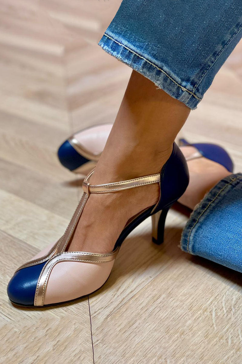 Side angle view of Alessia T-strap pumps styled with denim