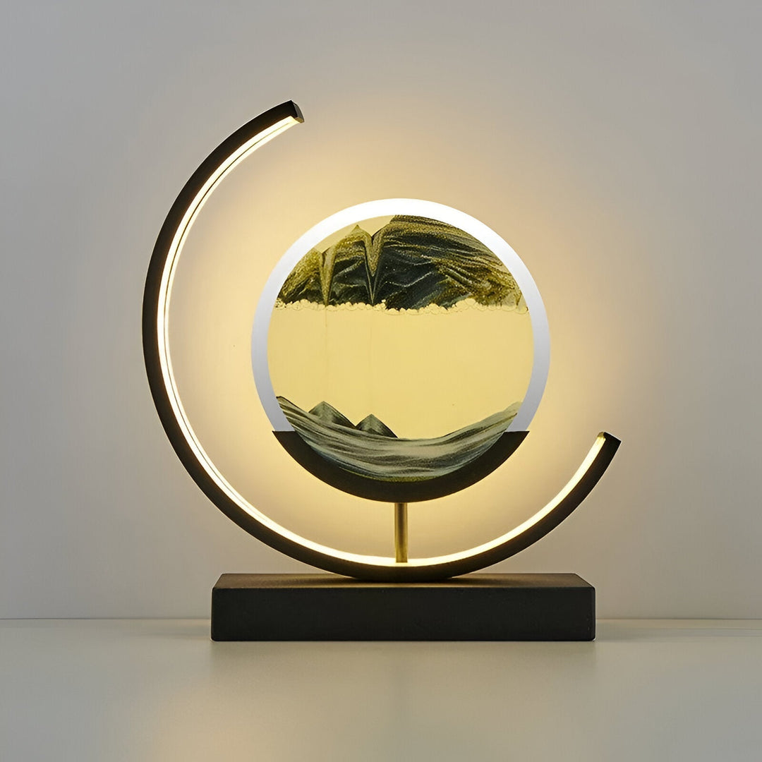 Decorative moving sand art table lamp casting a warm glow on a nightstand