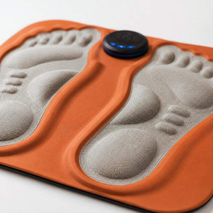 Close-up view of the textured acupressure surface on the orange foot massager pad