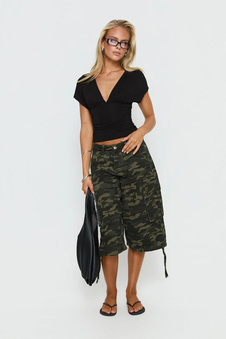 Hemline detail of women's relaxed fit summer utility shorts