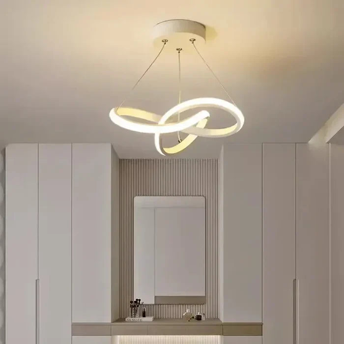 WaveGlow white modern LED ceiling light mounted in a minimalist living room