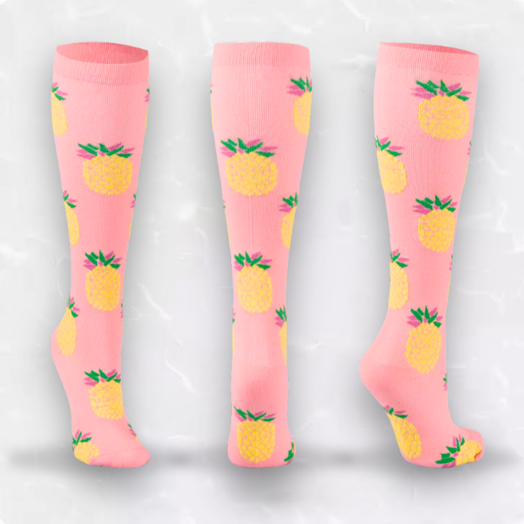 Pink pineapple design compression socks displayed from multiple angles