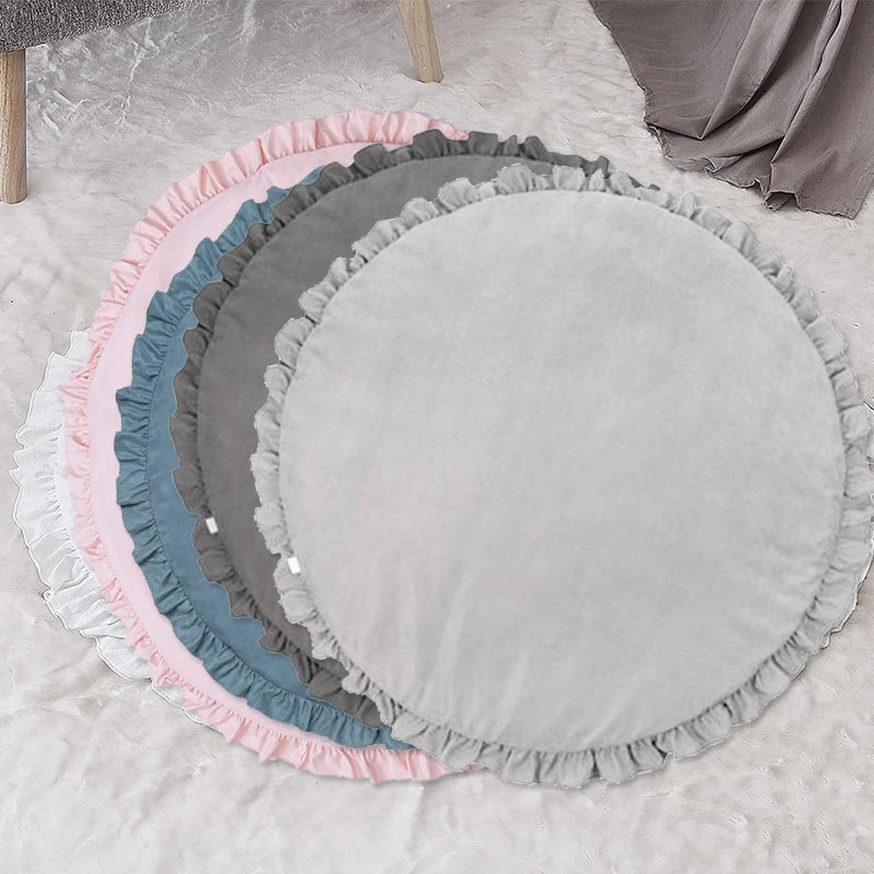 Blue round baby playmat styled for modern nursery interior design