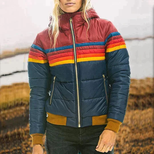 Woman wearing Dark Blue retro stripe puffer winter jacket with hood