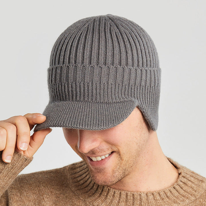 Close-up of gray winter beanie showing knit texture