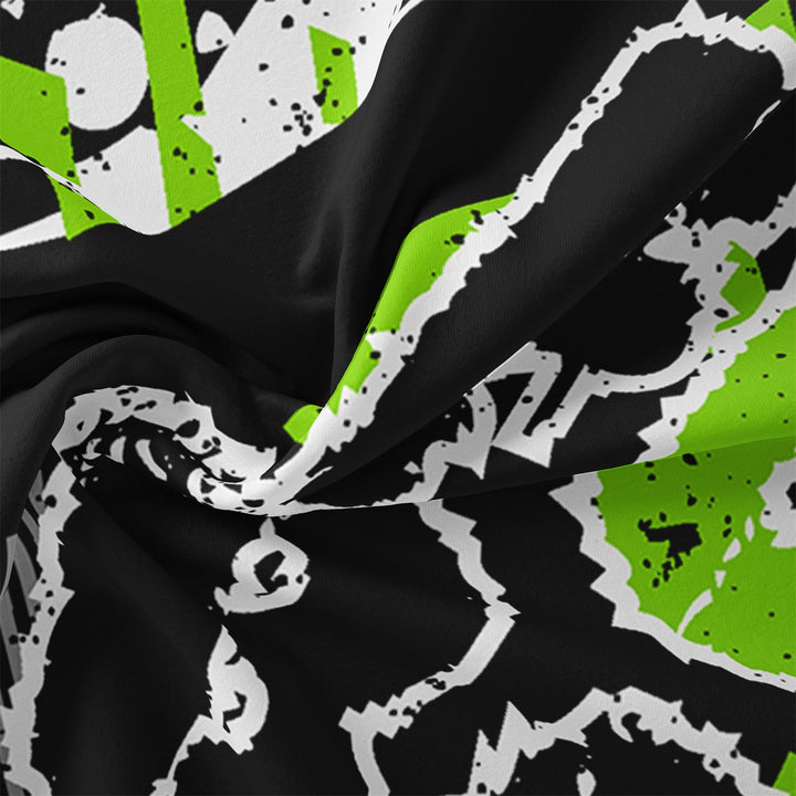 Detailed view of the soft textured fabric with black, white, and green pattern