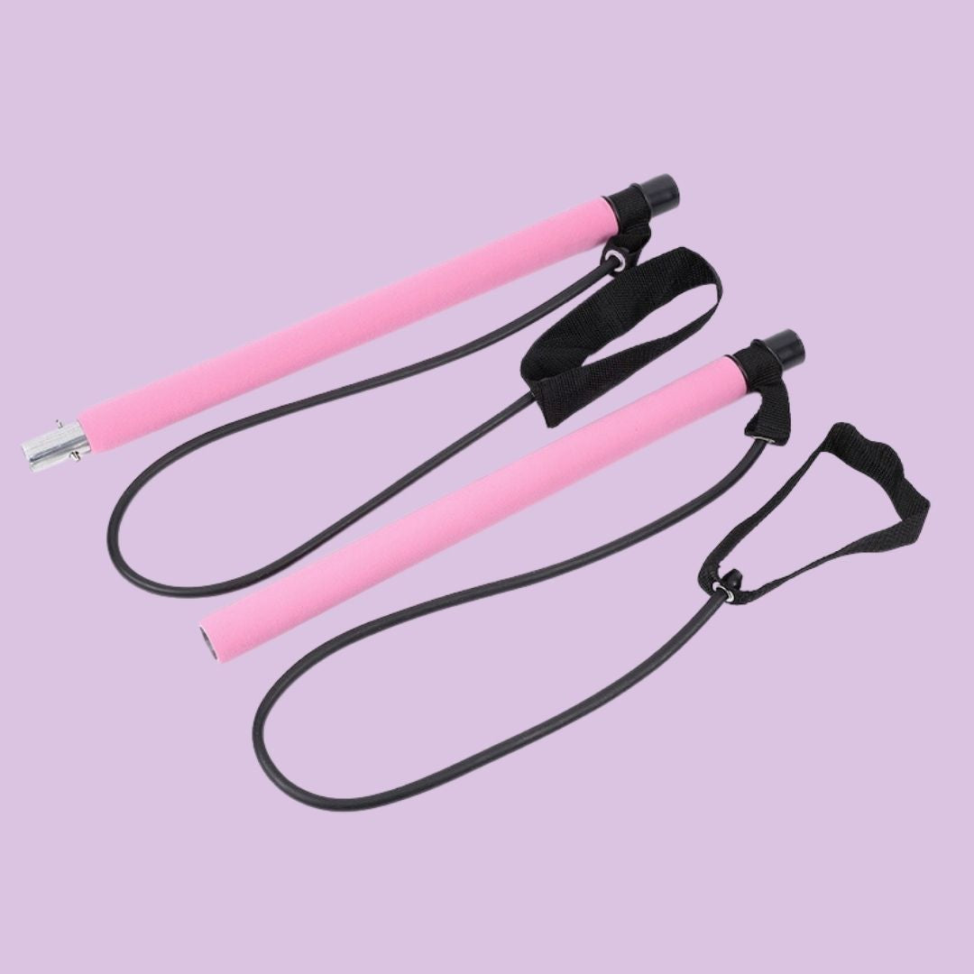 Pink fitness workout bar and resistance band set for yoga and stretching exercises
