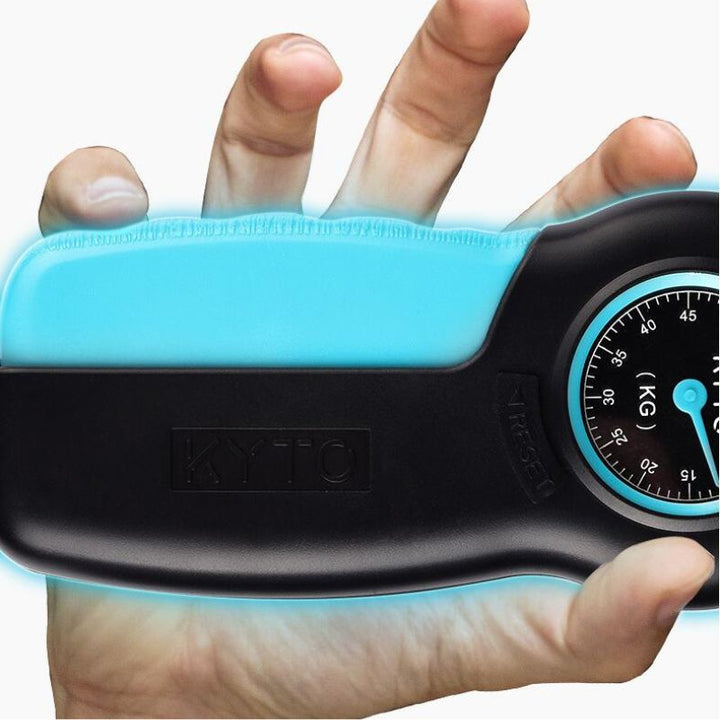 Close-up of hand dynamometer grip strength meter with digital display