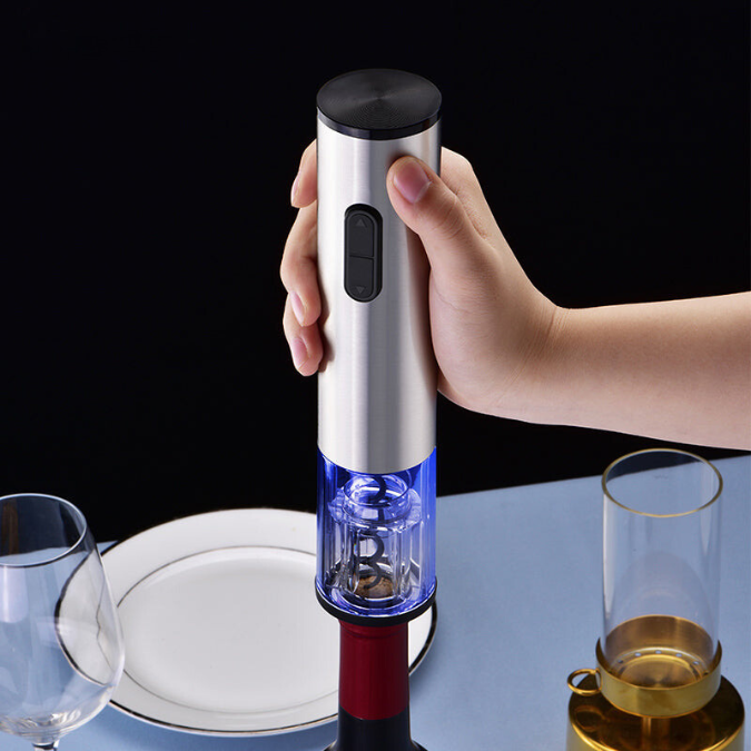 Complete electric corkscrew set with accessories displayed on modern kitchen counter