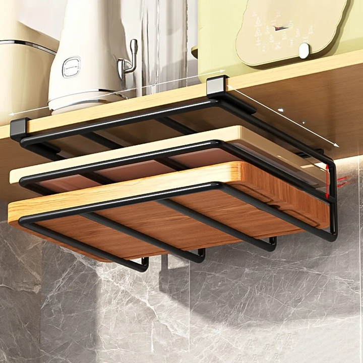 Double layer kitchen hanging organizer holding multiple cutting boards under a cabinet