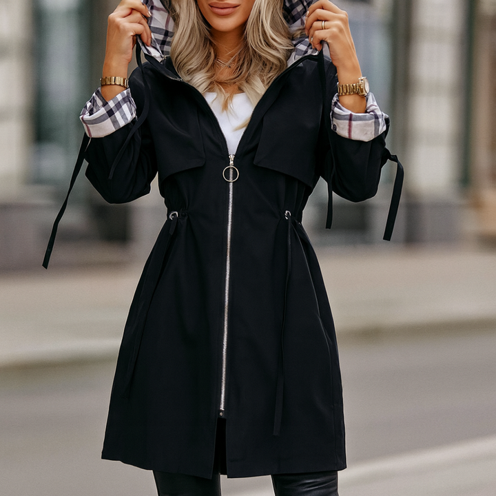 Back view of hooded zip coat jacket displaying seamless waterproof construction